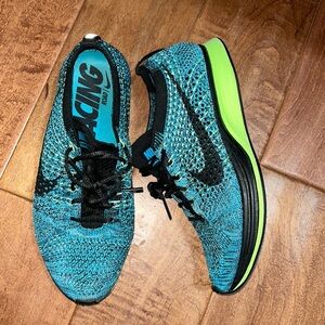 Nike flyknit racer sneakers size 5.5